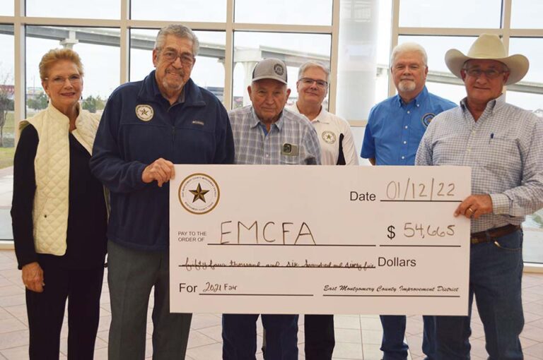 EMCID Presents Check to Fair Association to Cover Student Costs